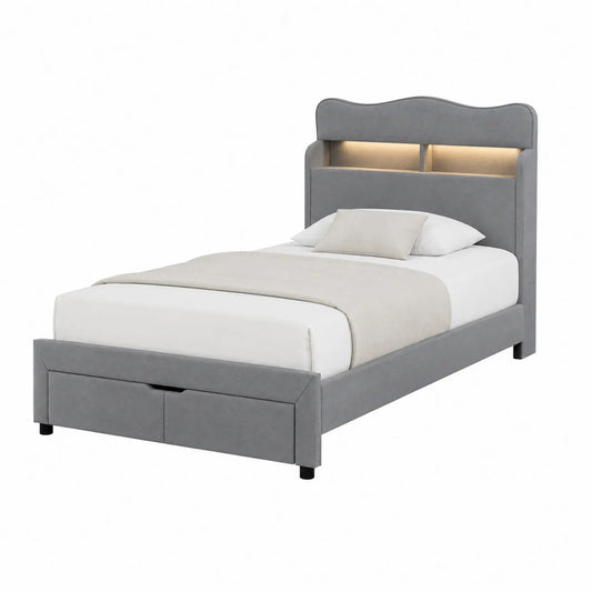 Cama individual de tela gris con luz y cajones